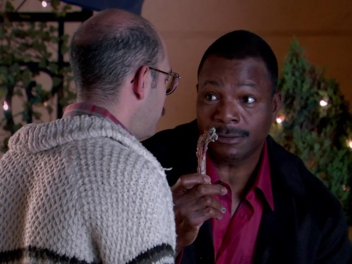 Baby, You've Got A Stew Going meme template: A bald man in glasses and a cardigan looks at another man who is holding a bone with meat scraps, as if presenting it for approval.