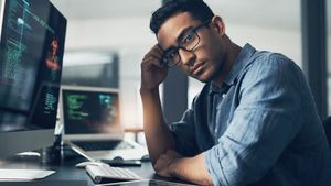 Professionals working with cloud infrastructure and data management. Credit: Shutterstock