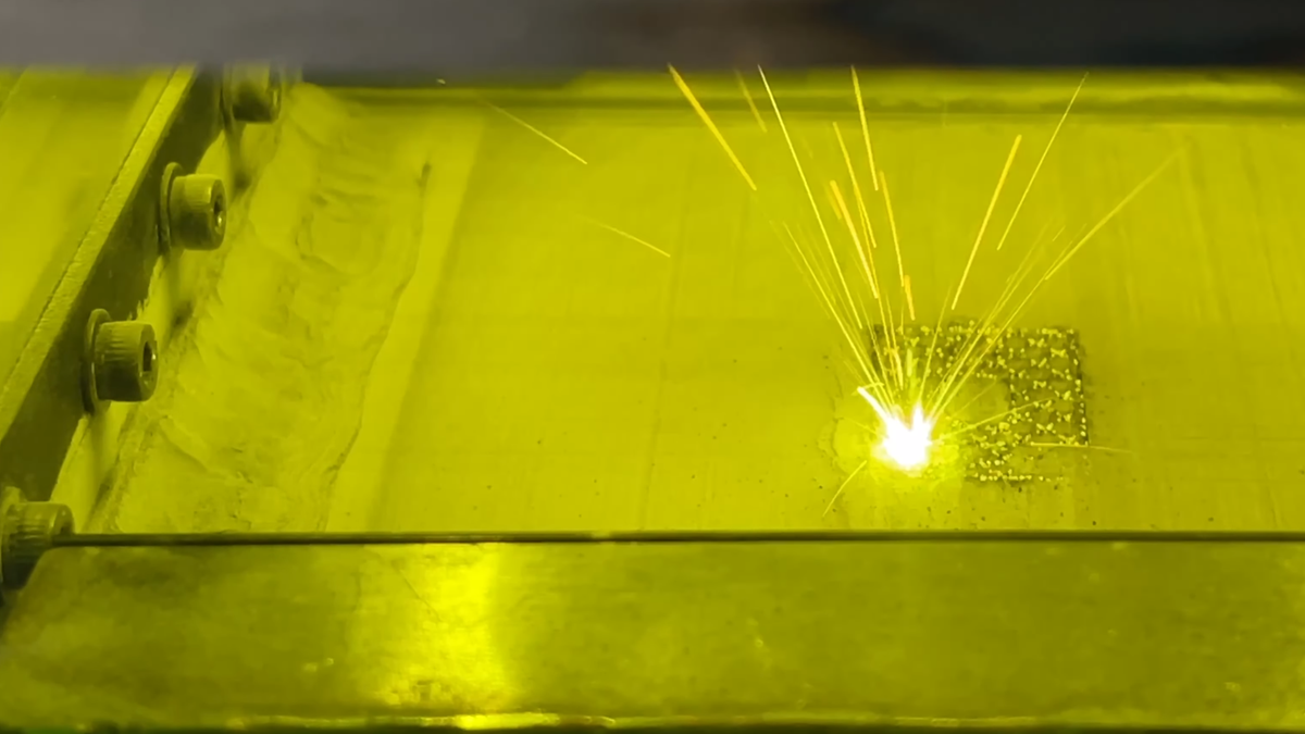 A view of an experimental selective laser melting (SLM) 3D printer in operation. Credit: hackaday.com