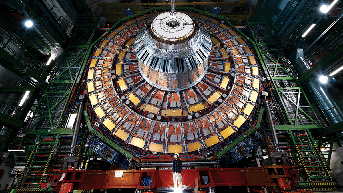 An artificial intelligence system analyzing complex data streams for novel insights in physics. Credit: spectrum.ieee.org
