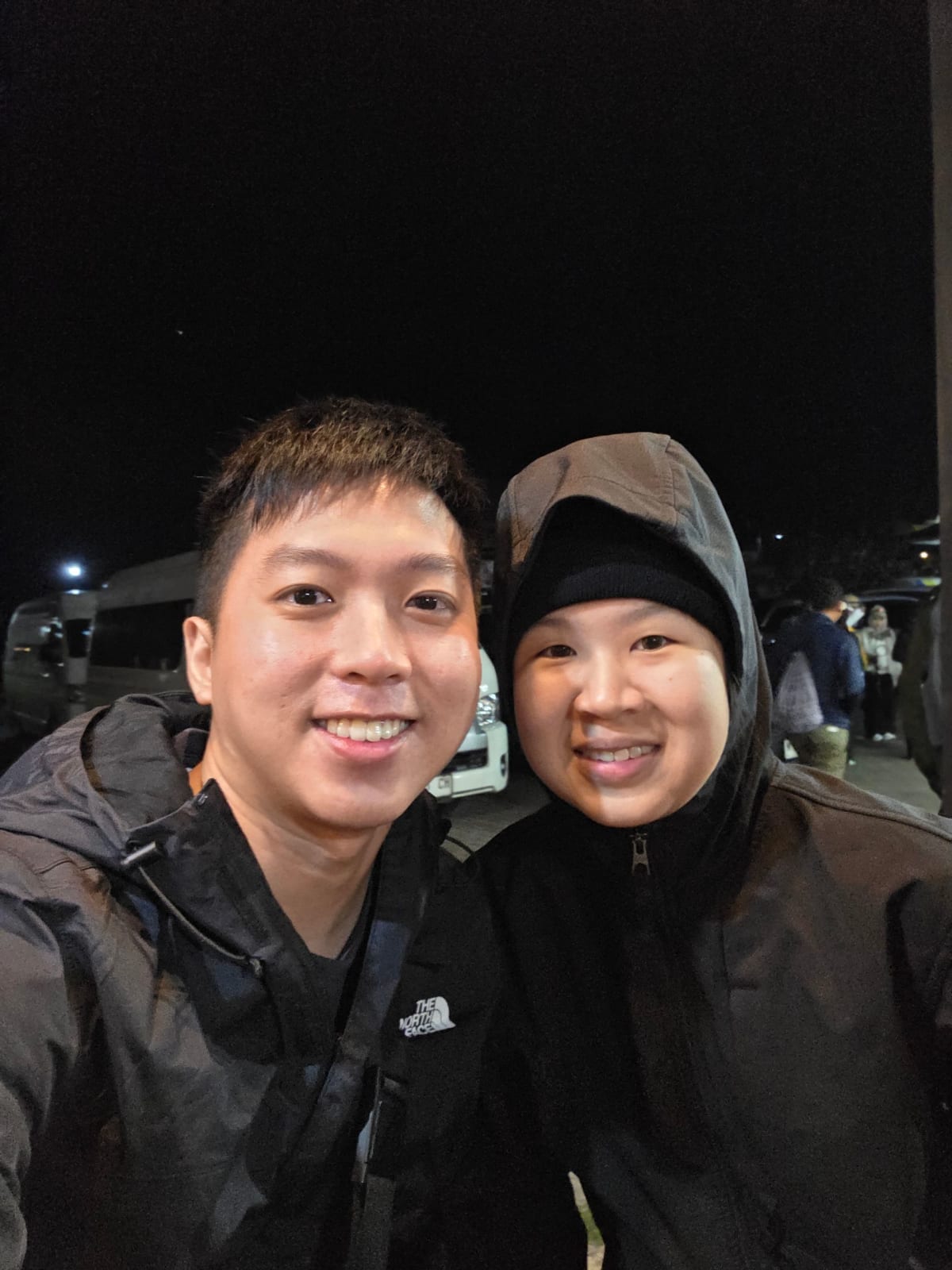 2 humans at carpark near Ijen