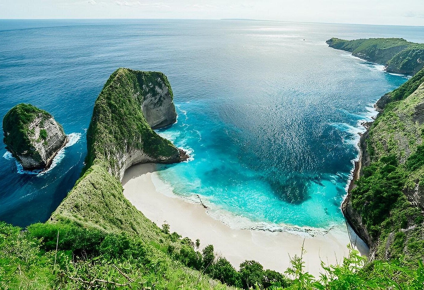 Dramatic sea cliffs and turquoise water at Nusa Penida