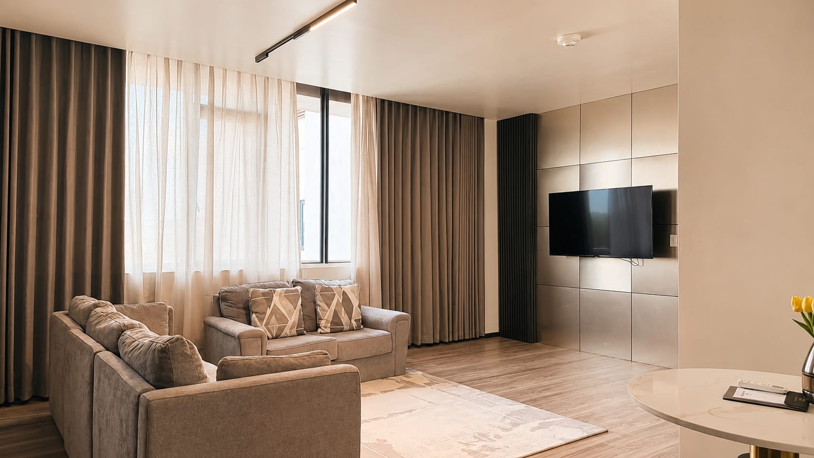 Spacious suite living area prepared for an extended stay