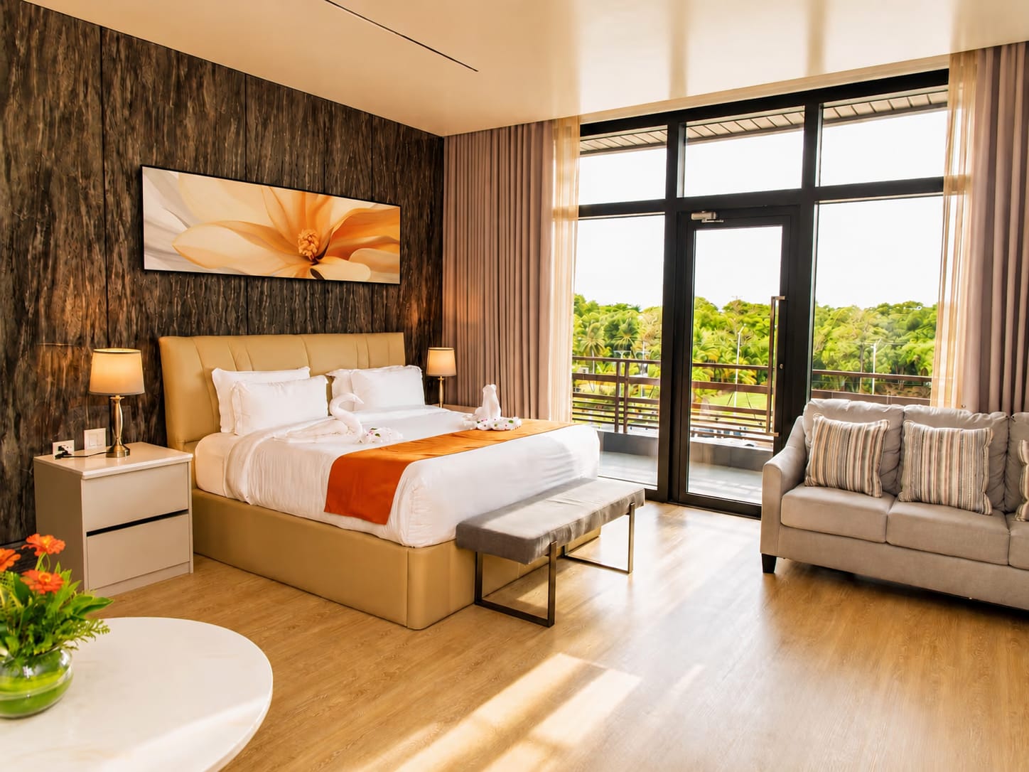 Junior Executive Suite at Grand Resort & Residences Belize with terrace doors opening to Belize River views