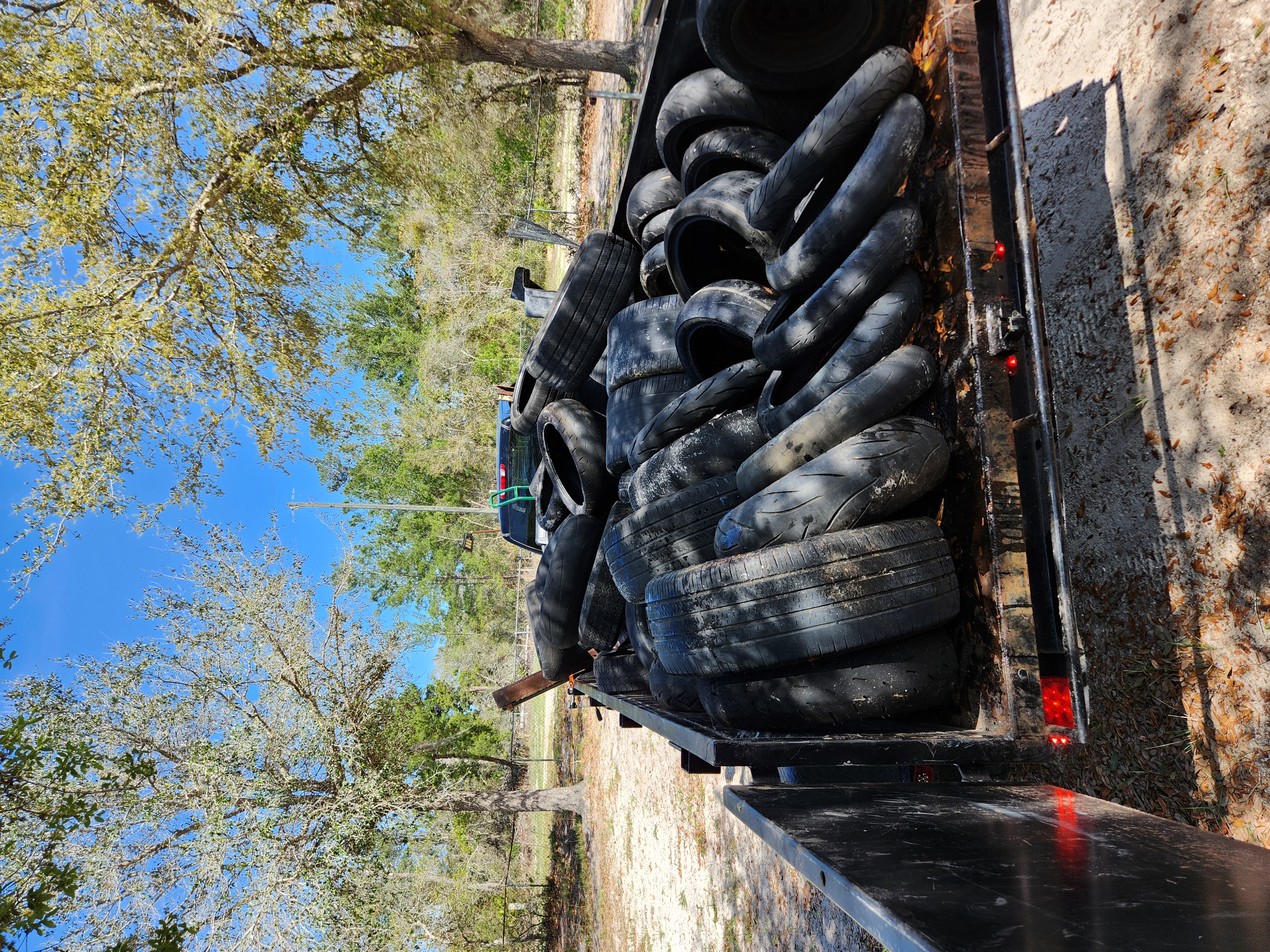 Used tire load prepared for removal