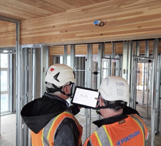 Polygon experts setting up sensors for monitoring of mass timber construction.