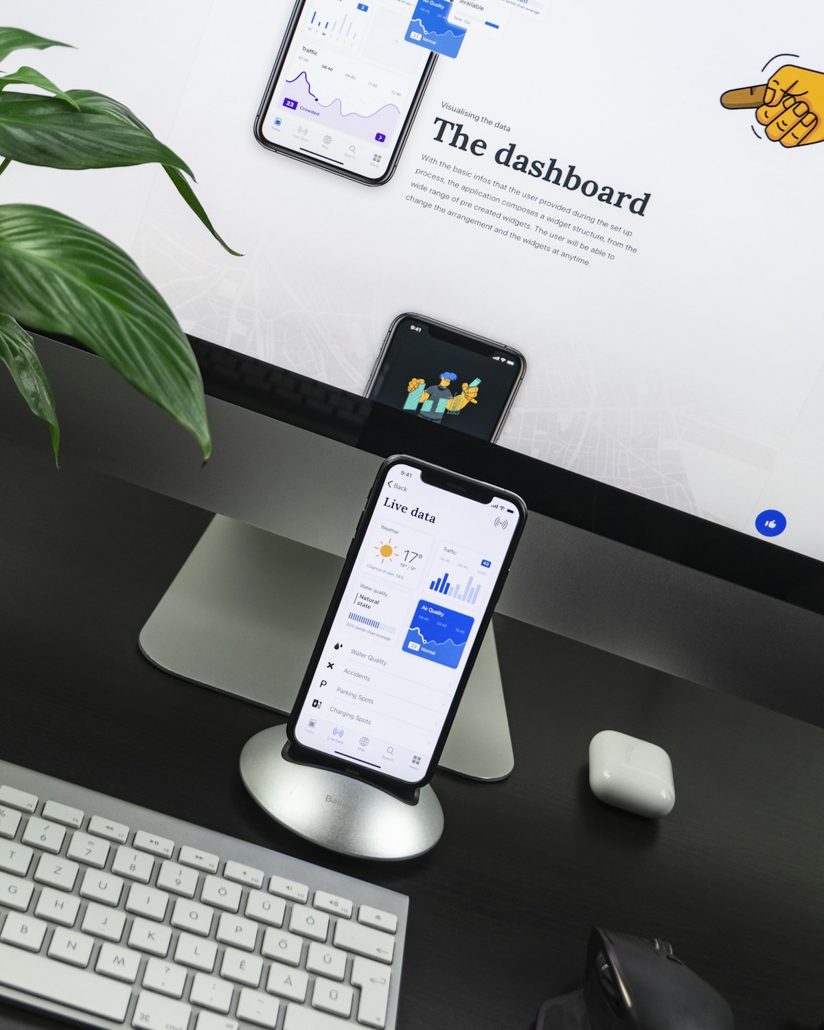 Smartphone and desktop computer set up for app design work