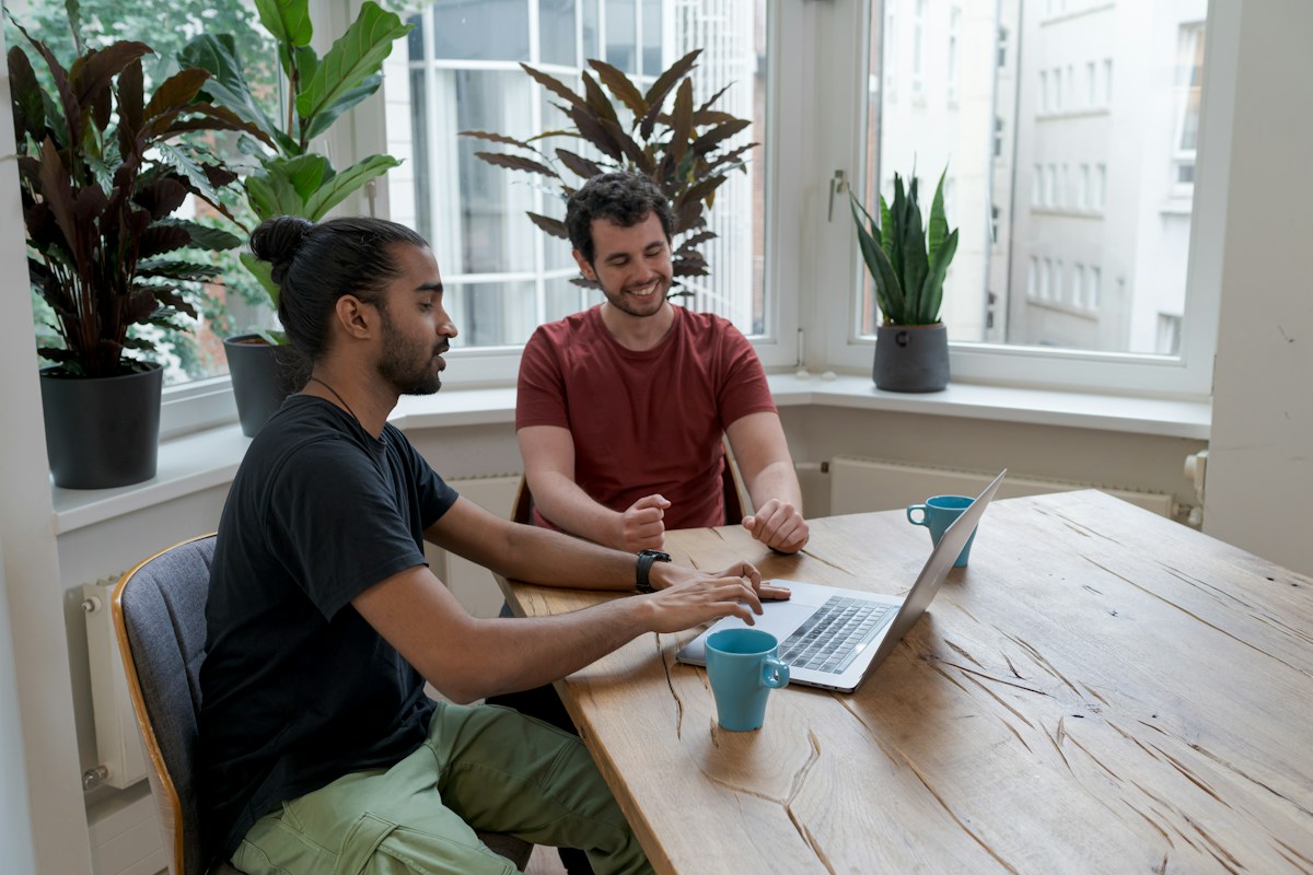 Colleagues reviewing a software product together