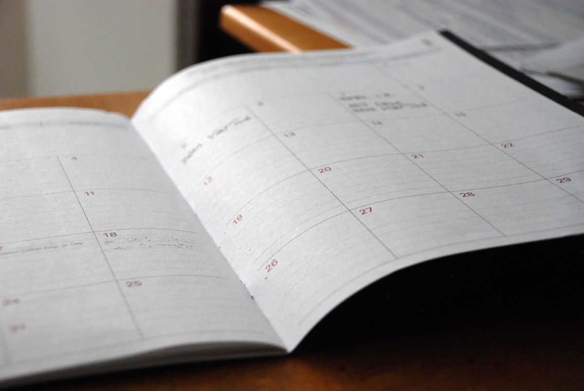 Open monthly planner on a desk