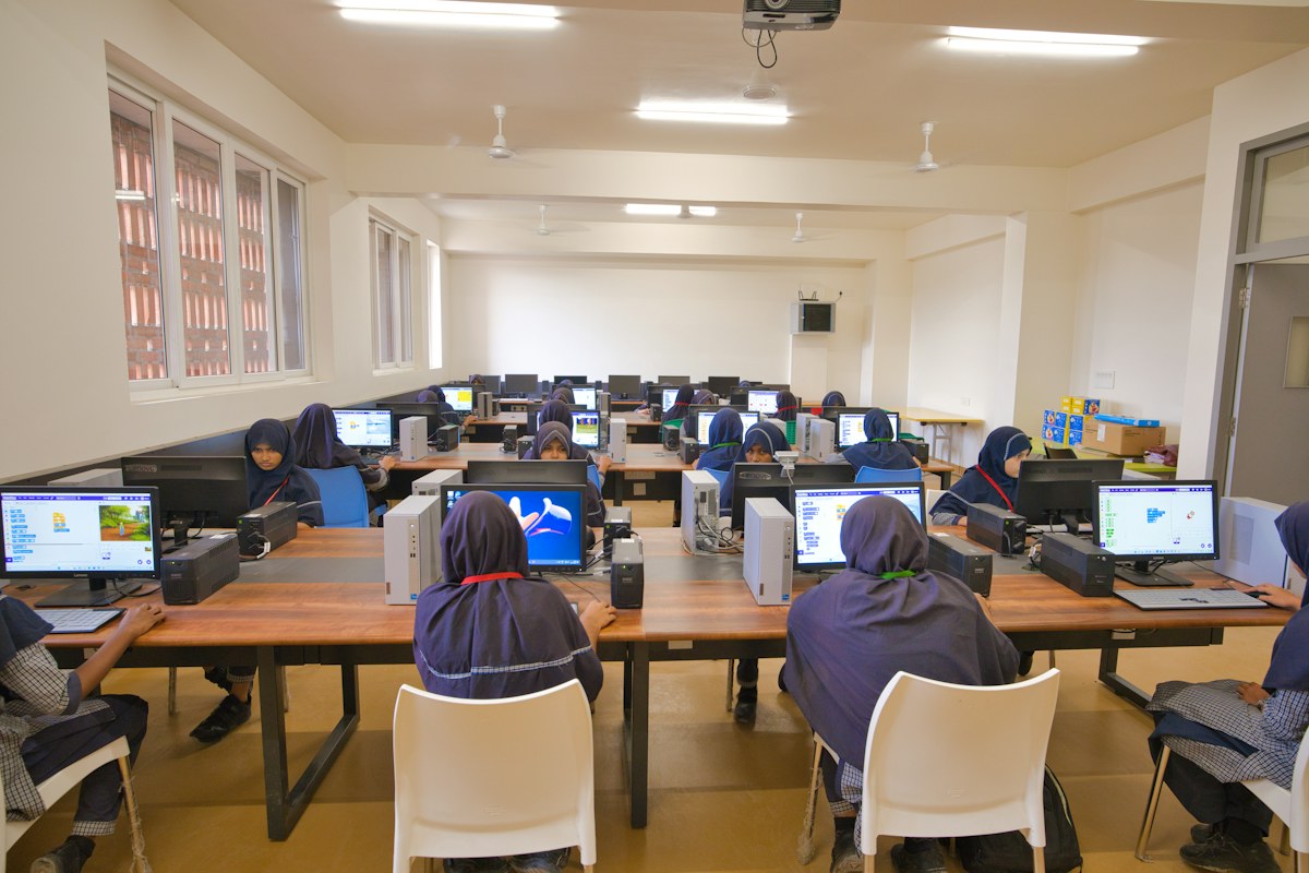 Students working at computers in a school lab