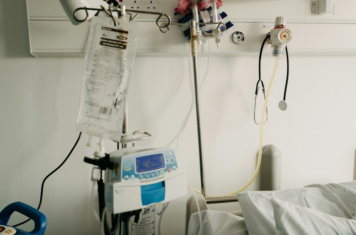 Hospital room with a bed and medical equipment