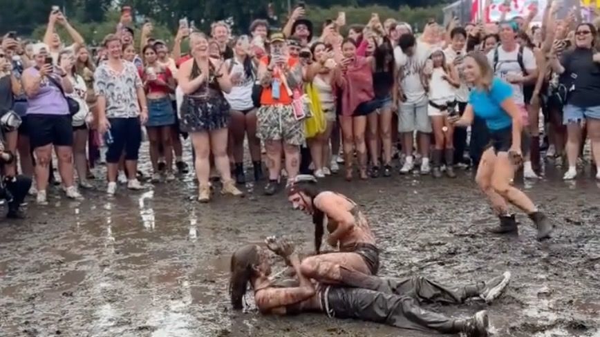 lesbian mud wrestling at lolla 2026 is giving main character energy