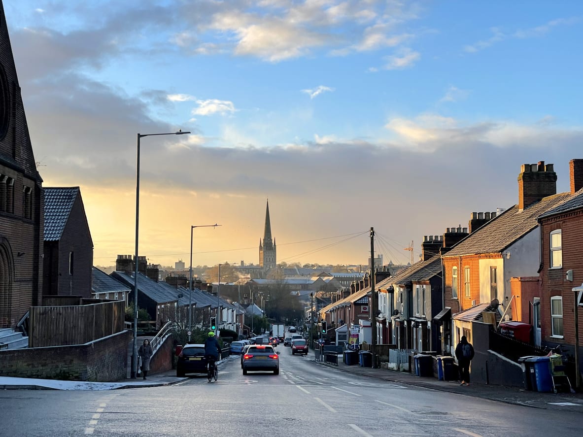 Street view of Norwich in Norfolk with norwich cathedral on the horizon