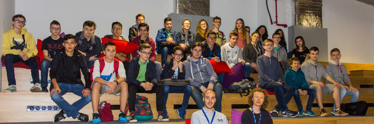 Everyone gathered on tiered steps for a group photograph