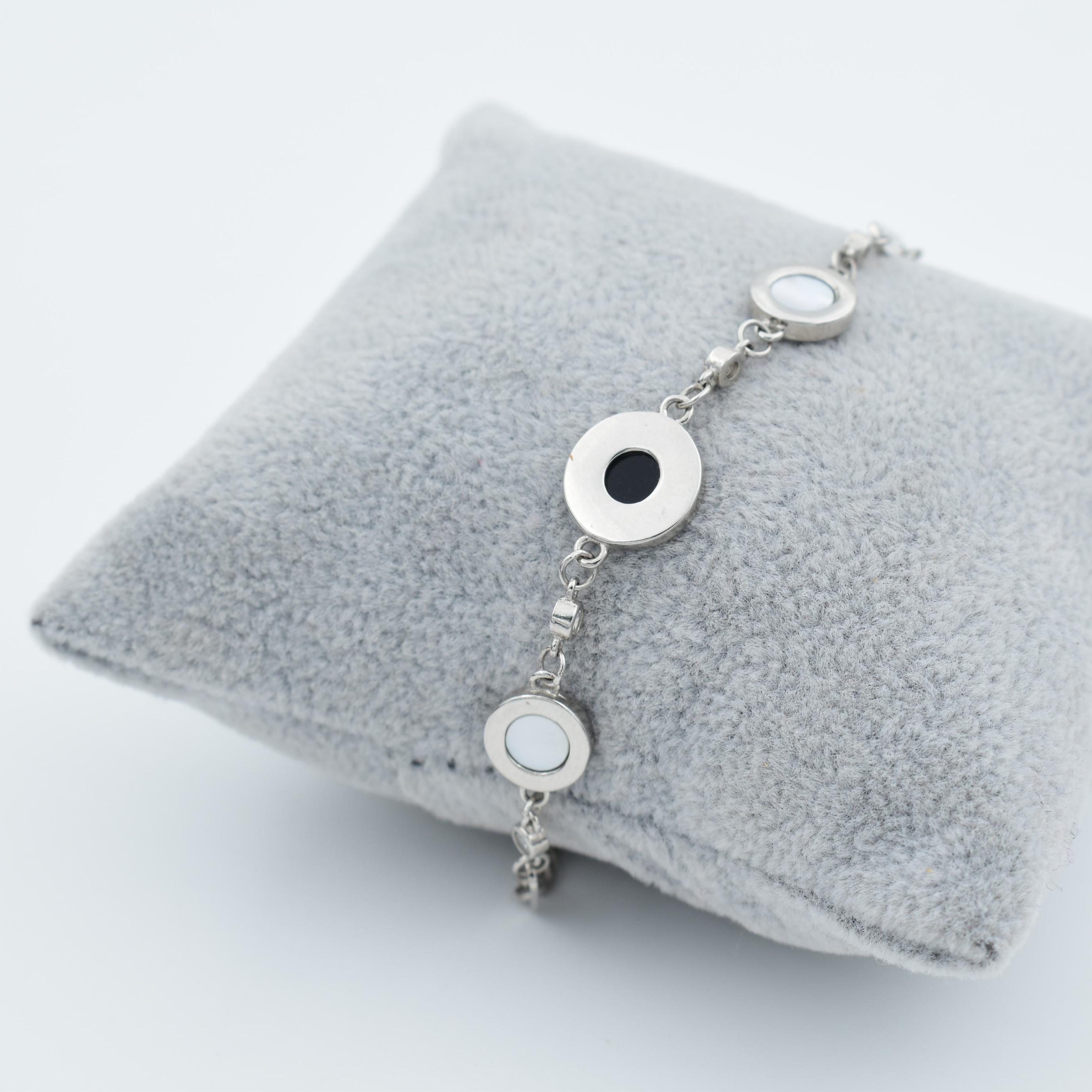 Sterling Silver Black And White Disc Charm Bracelet