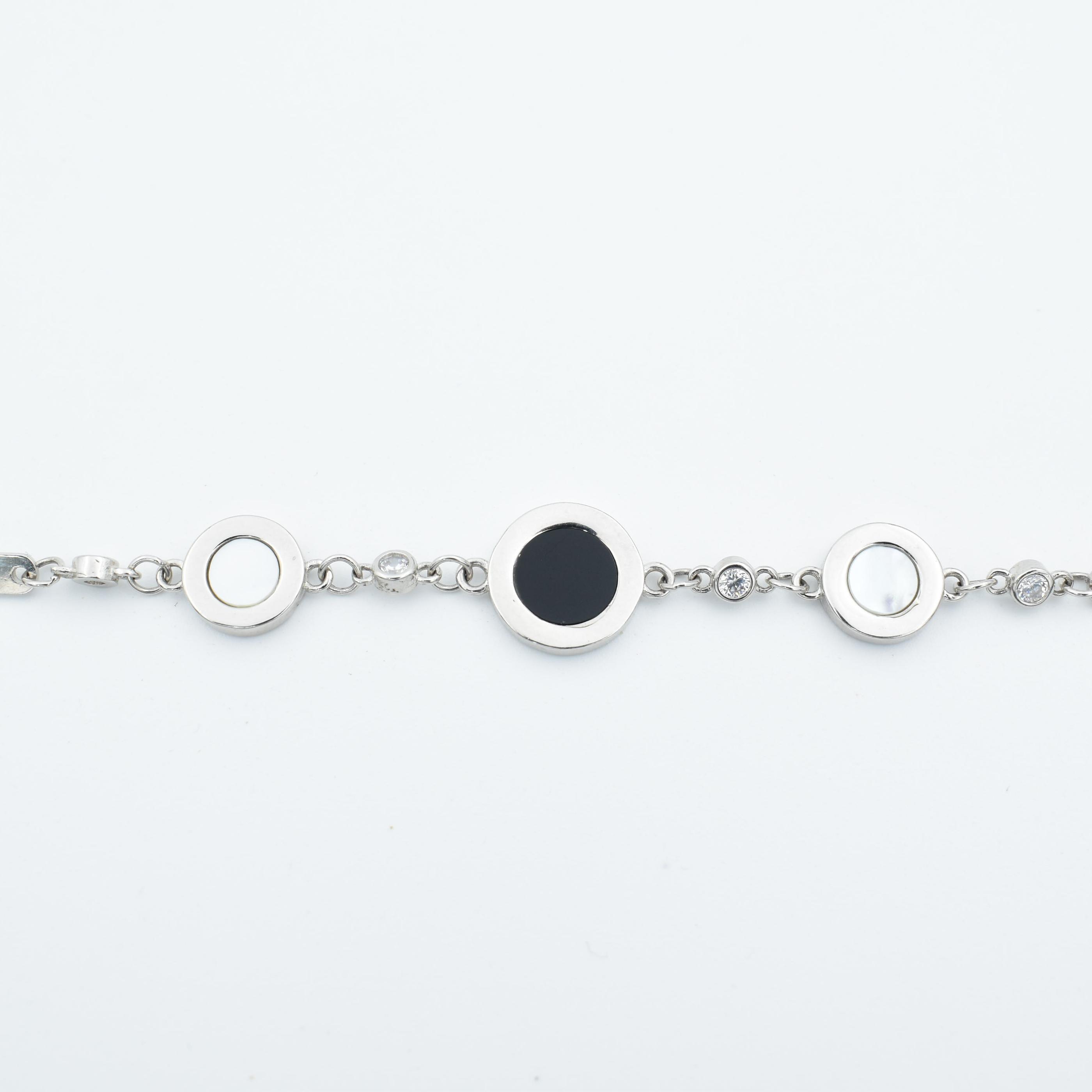 Sterling Silver Black And White Disc Charm Bracelet