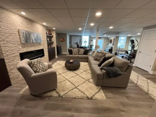 Denville NJ Basement 1 - Completed - Long view of the full new basement room Denville NJ Basement 1 - Completed - Long view of the full new basement room