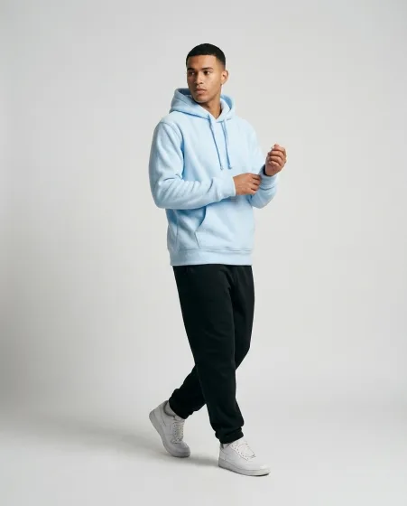 Model Shot result — light blue hoodie on a male model with gray studio background