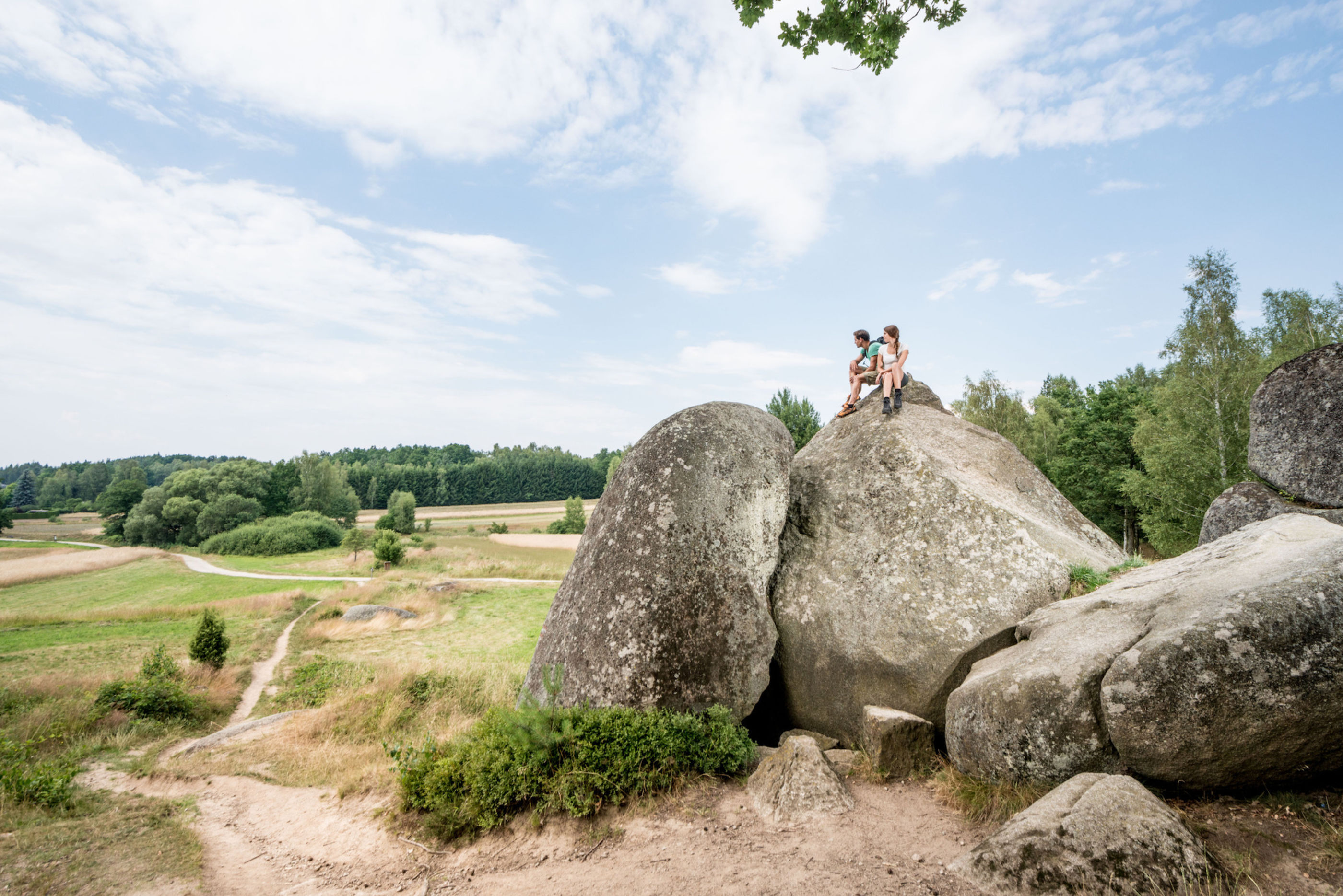 Blockheide Gmünd Erwachsene auf Steinen