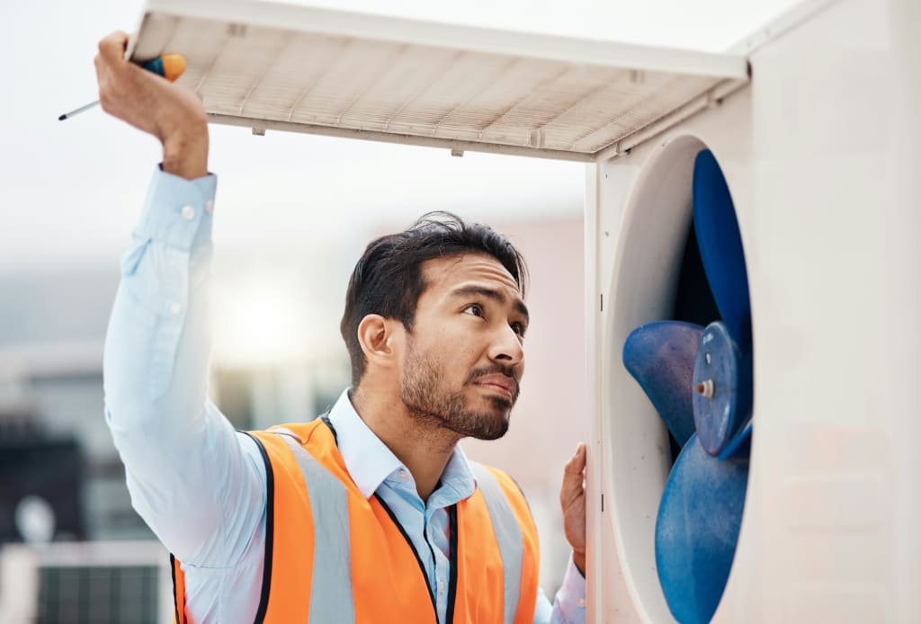 Engineer man, air conditioning and maintenance on roof, industry and inspection with thinking in ci