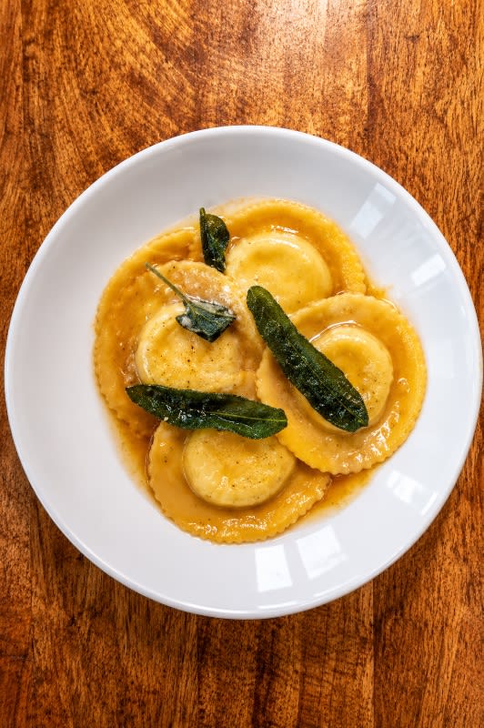 Primi Ravioli Della Casa with Ricotta Cheese, Spinach, and Rosa Sauce