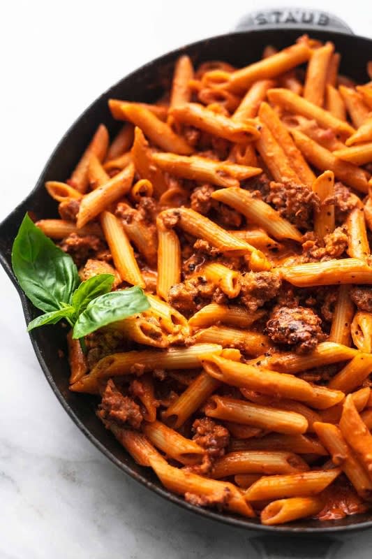 Primi Penne Con Salsiccia with Italian Sausage, Mushrooms, Pine Nuts, and Tomato Sauce