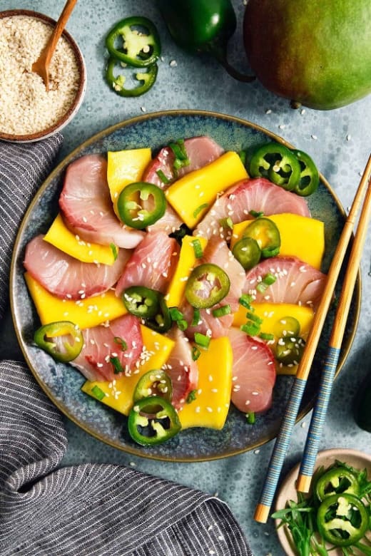 Ahi Tuna Crudo topped with Mango, Jalapeno, and Ponzu Sauce