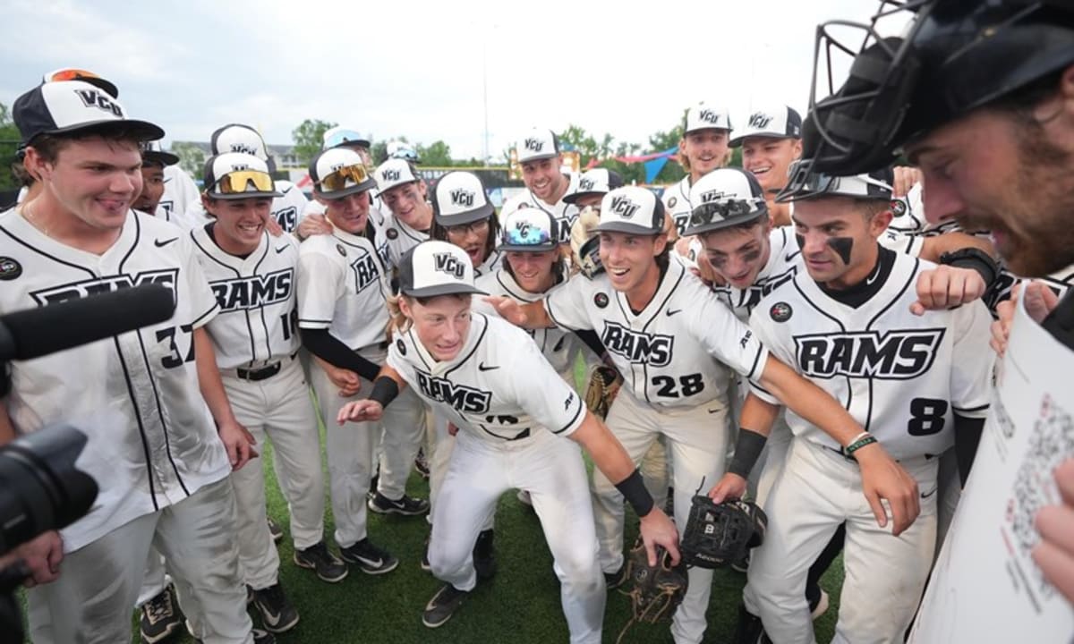 VCU baseball players celebrating on field after comeback victory in Atlantic 10 tournament