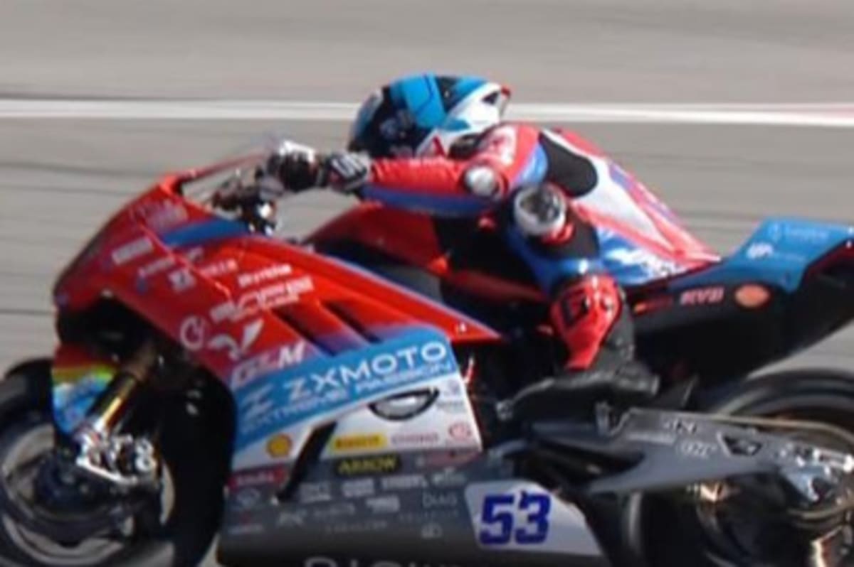 ZXMOTO racing motorcycle crossing finish line at World Superbike Championship in Portugal