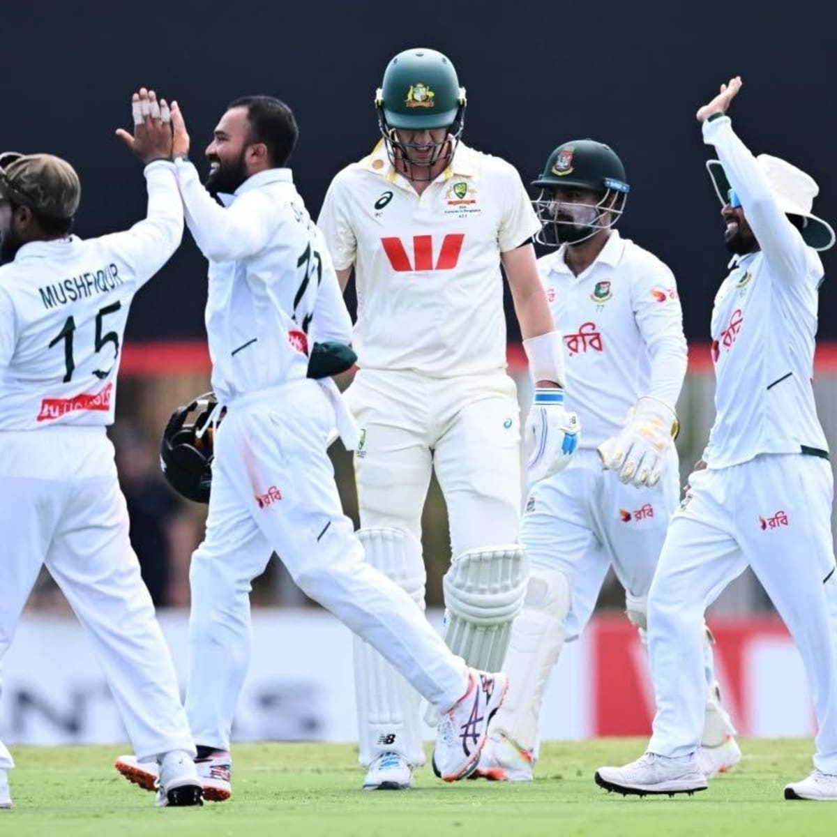 ** Bangladesh cricket players celebrating historic nine wicket Test victory over Australia in Darwin