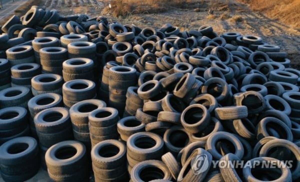 Automated recycling facility sorting discarded clothing and tires using artificial intelligence technology in South Korea