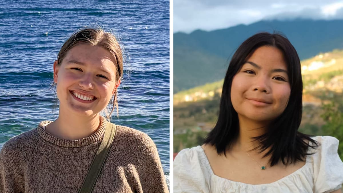 Two smiling college students in laboratory coats working with scientific equipment at Lafayette College