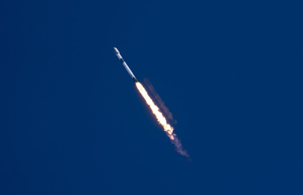 SpaceX Falcon 9 rocket launching from Vandenberg Space Force Base in California with satellite payload