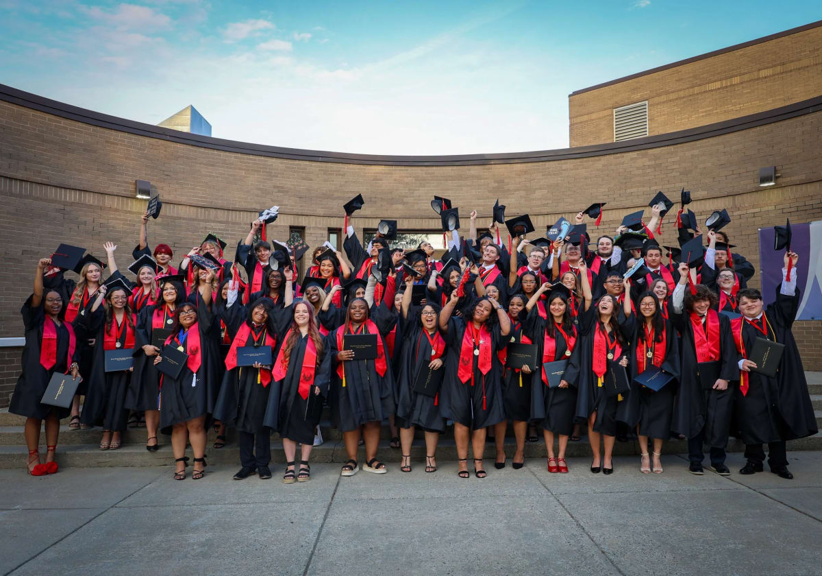 Lenoir County Early College High School graduates in caps and gowns celebrating their 2026 commencement ceremony