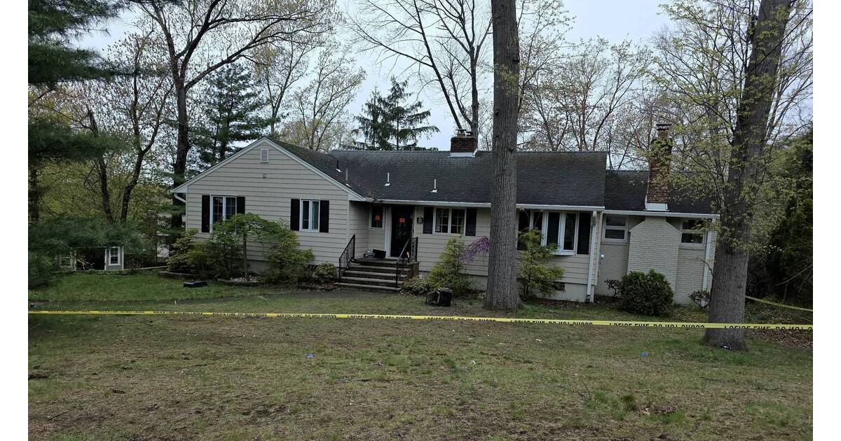 Exterior view of single-family home on Brookside Drive in Wayne, New Jersey after house fire