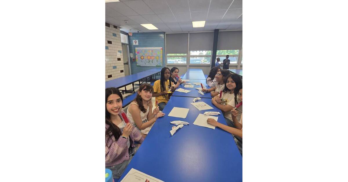 Roosevelt School students celebrating Honor Roll achievement at awards ceremony in Rahway, New Jersey