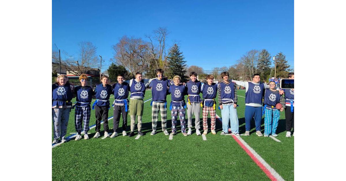 Students from Wall Township and Manasquan High Schools compete together in Unified flag football game