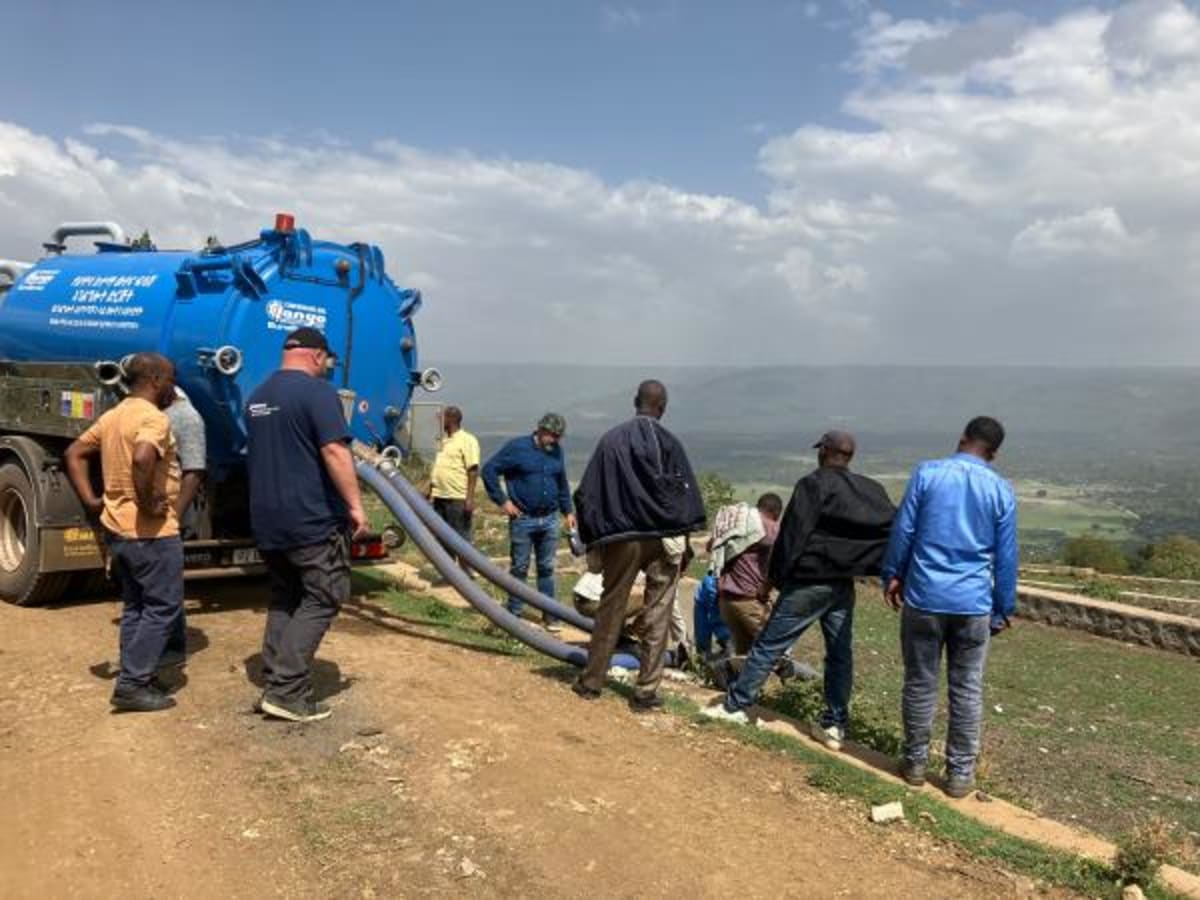 Ethiopian water utility workers learning to operate wastewater treatment equipment with Dutch trainers