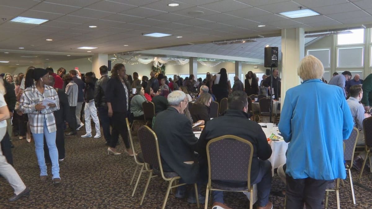 Attendees gather at Friends for Hope breakfast celebrating addiction recovery and mental health resilience