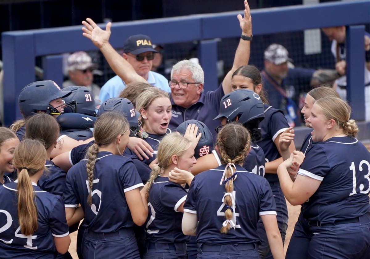 ** Shaler High School softball team celebrates after winning Pennsylvania state championship with grand slam