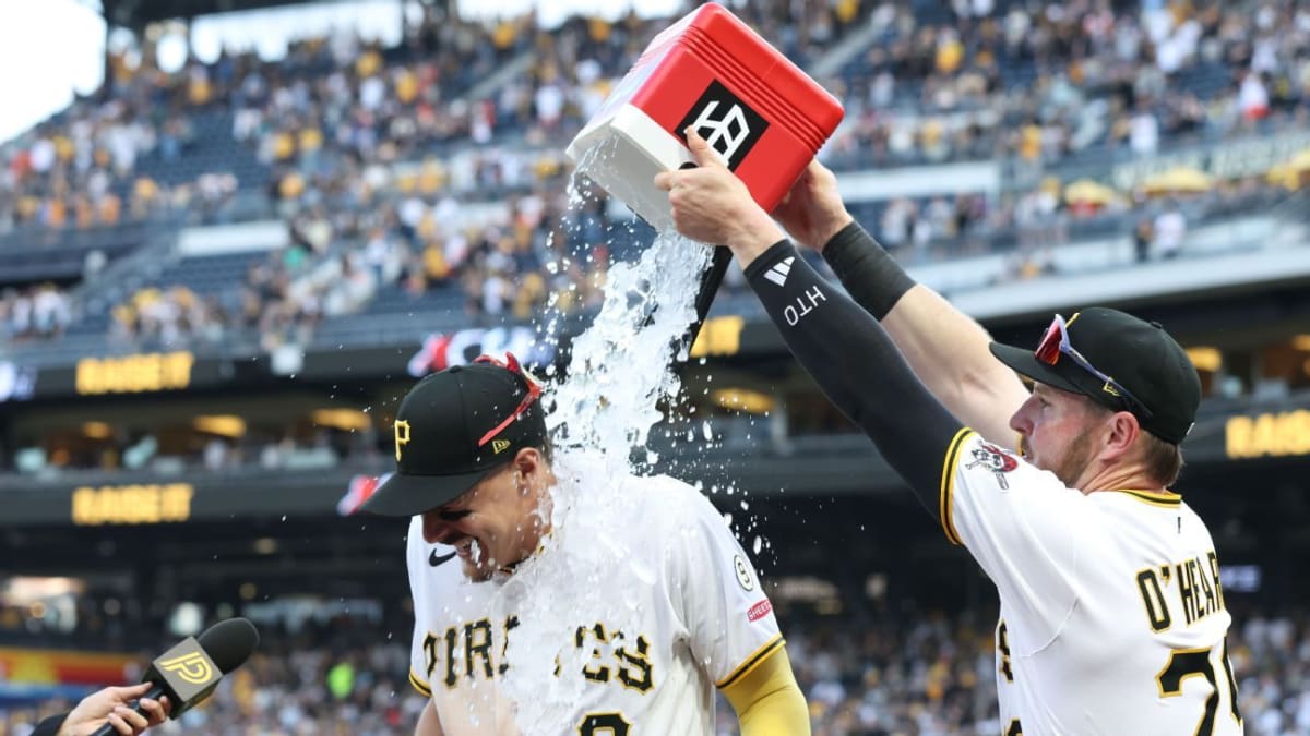 Konnor Griffin batting in white Pittsburgh Pirates uniform during his MLB debut at PNC Park