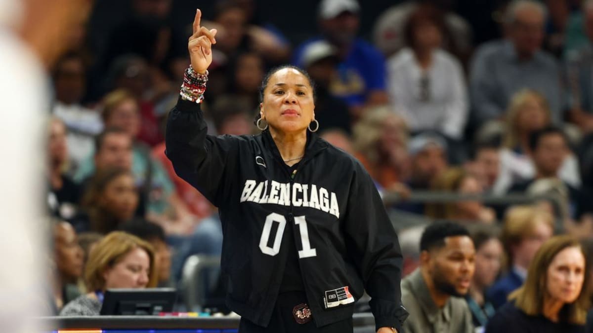 South Carolina coach Dawn Staley and UCLA coach Cori Close embracing before championship game