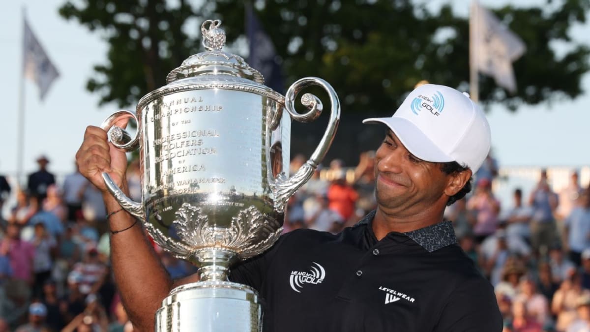 Aaron Rai holding the Wanamaker Trophy after winning the PGA Championship at Aronimink Golf Club