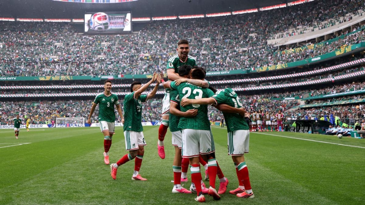 Mexican soccer fans celebrate at packed Estadio Azteca during 2026 World Cup opening match