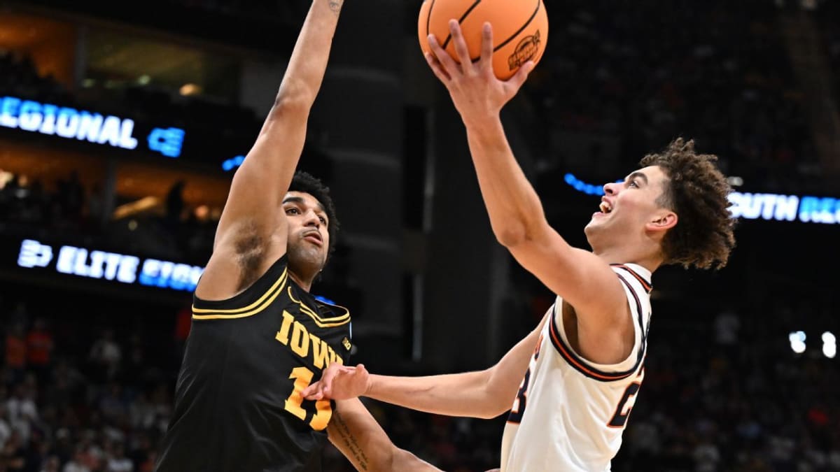 Keaton Wagler shooting basketball for Illinois Fighting Illini in Elite Eight victory celebration