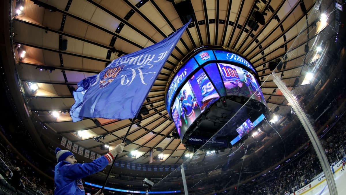 Madison Square Garden arena filled with hockey fans during a professional women's hockey game