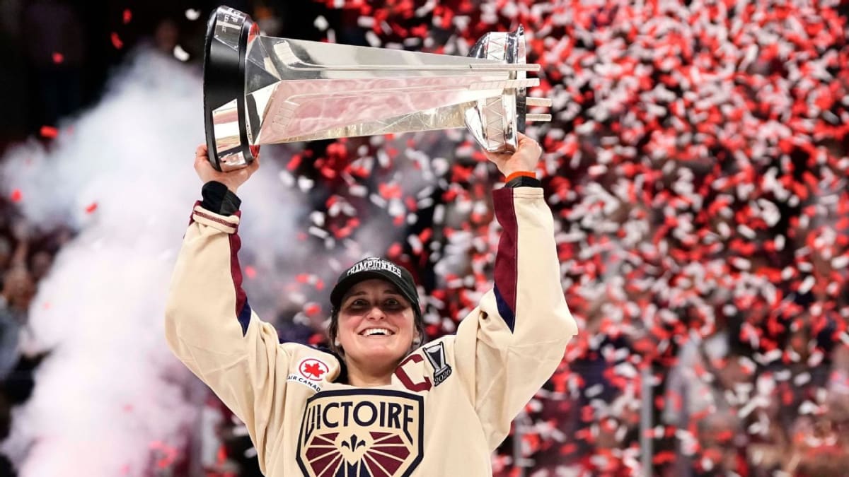 The silver Walter Cup trophy standing tall with PWHL championship engraving visible