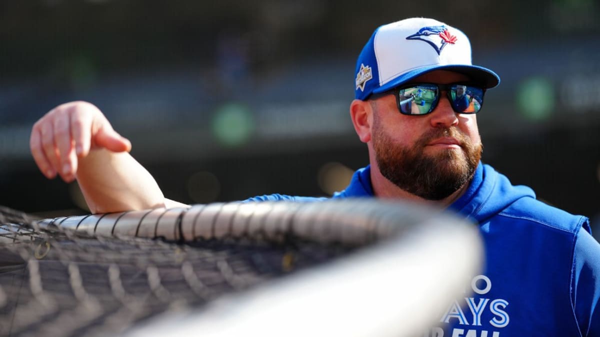 Toronto Blue Jays manager John Schneider in the dugout during a baseball game