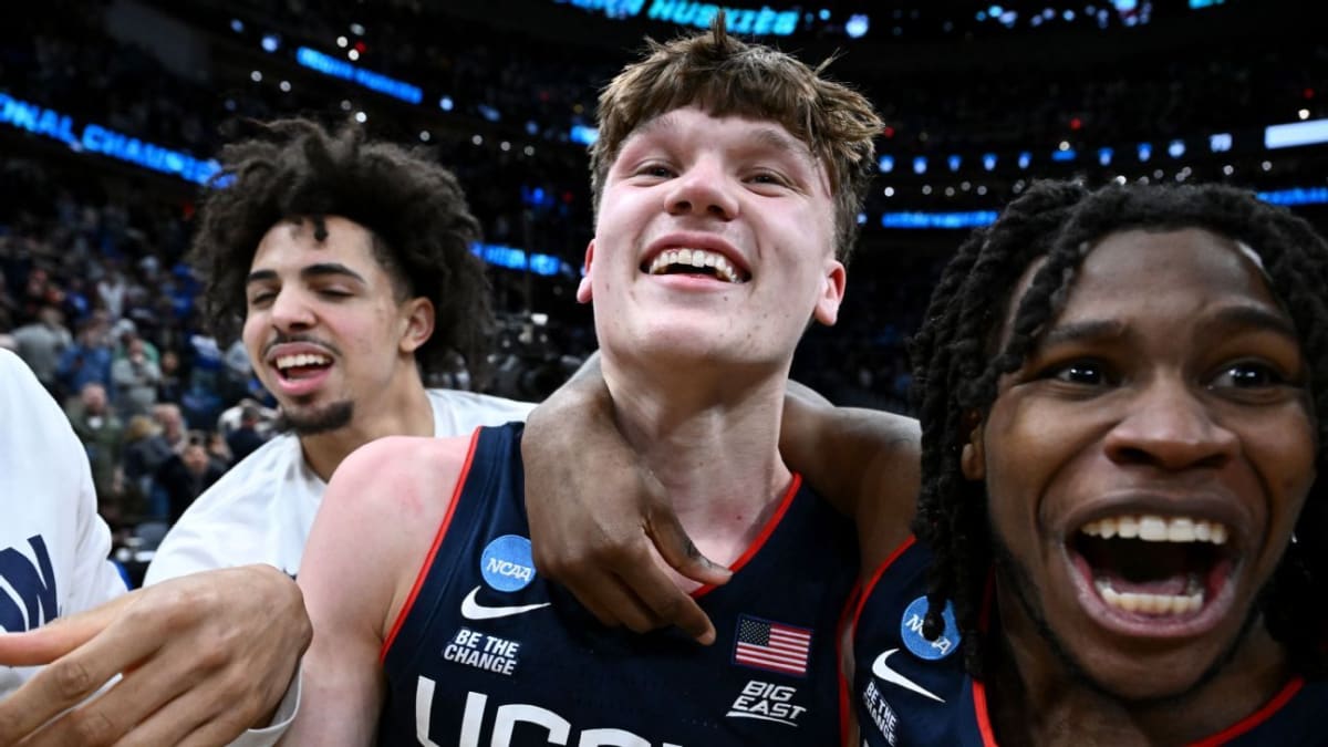 Braylon Mullins in UConn jersey celebrating game-winning shot against Duke in NCAA tournament