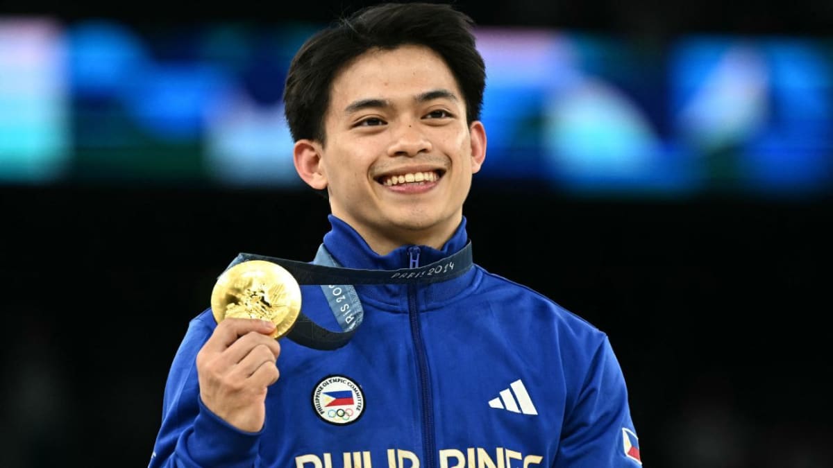 Filipino gymnast Carlos Yulo performing on floor exercise at major competition
